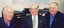 Left to right: IARU Region II President Tom Atkins, VE3CDM; Fred Hammond, VE3HC; and IARU President Larry Price, W4RA, at Fred Hammond's Museum of Radio in Guelph, Ontario, in 1997.
